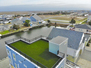 Mystic Islands Waterfront Rooftop by ForeverLawn South Jersey