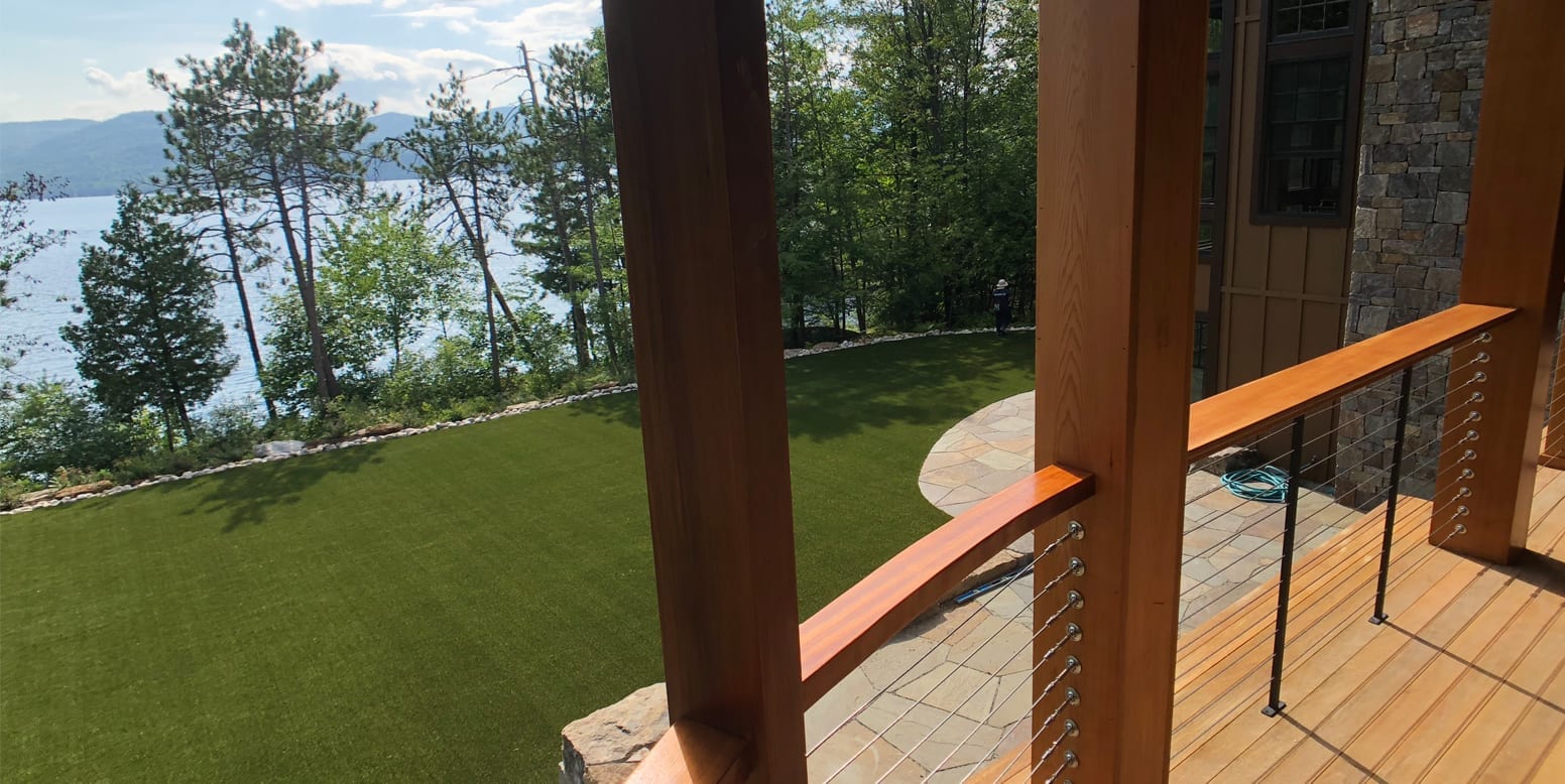 Putnam Station, NY, winter home backyard featuring GolfGreens® Pro Putt & Chip and DuPont™ ForeverLawn® Select EL