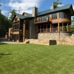 Putnam Station, NY, winter home backyard featuring GolfGreens® Pro Putt & Chip and DuPont™ ForeverLawn® Select EL