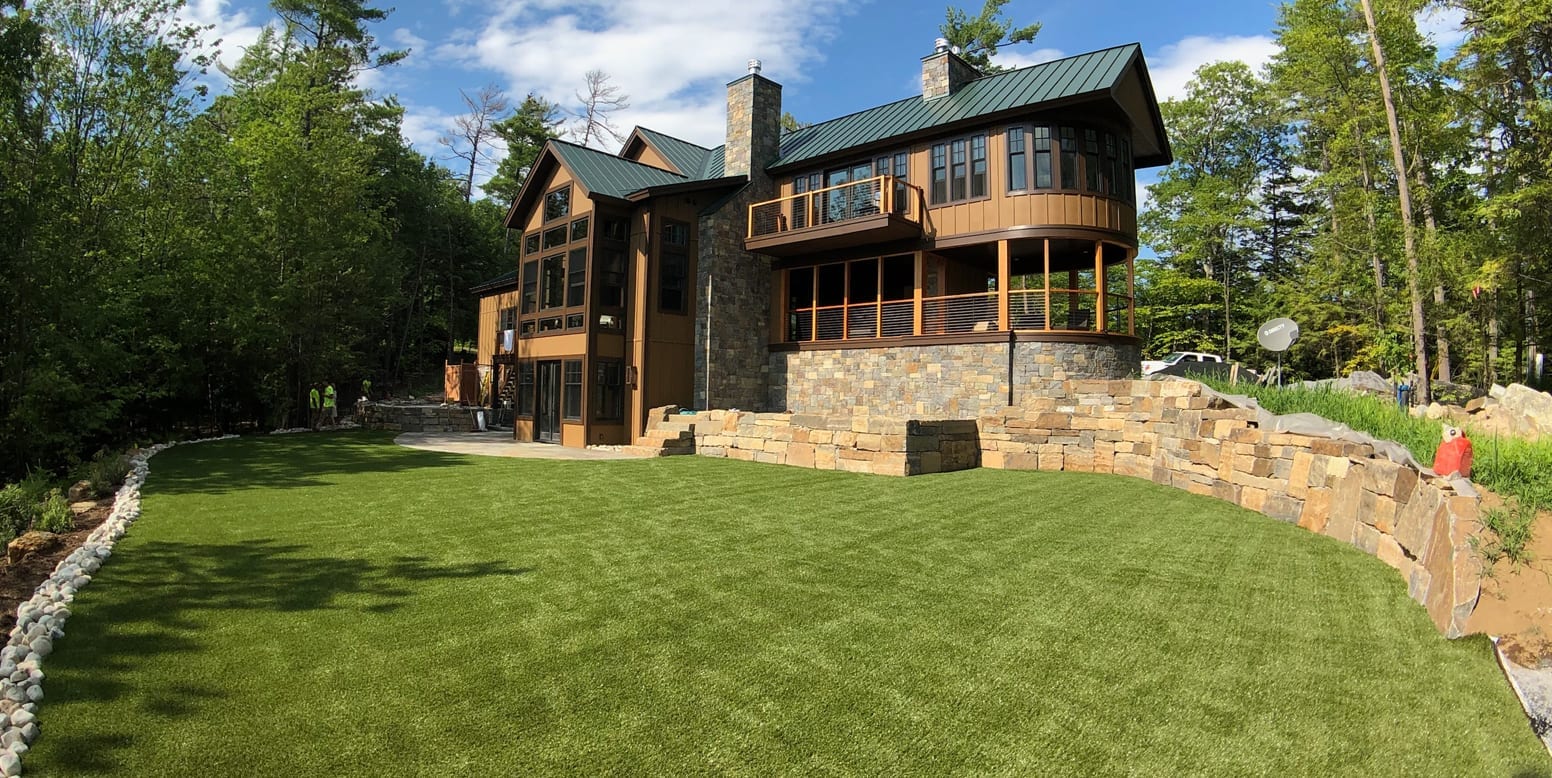 Putnam Station, NY, winter home backyard featuring GolfGreens® Pro Putt & Chip and DuPont™ ForeverLawn® Select EL