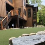 Putnam Station, NY, winter home backyard featuring GolfGreens® Pro Putt & Chip and DuPont™ ForeverLawn® Select EL