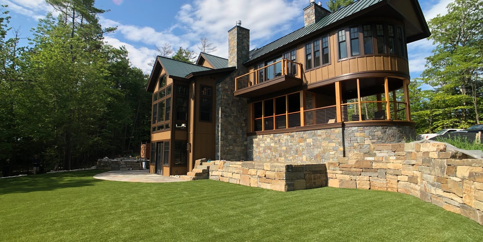 Putnam Station, NY, winter home backyard featuring GolfGreens® Pro Putt & Chip and DuPont™ ForeverLawn® Select EL