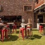 Redneck Riviera in Nashville, Tennessee, featuring Dupont™ ForeverLawn® Select VR on the rooftop