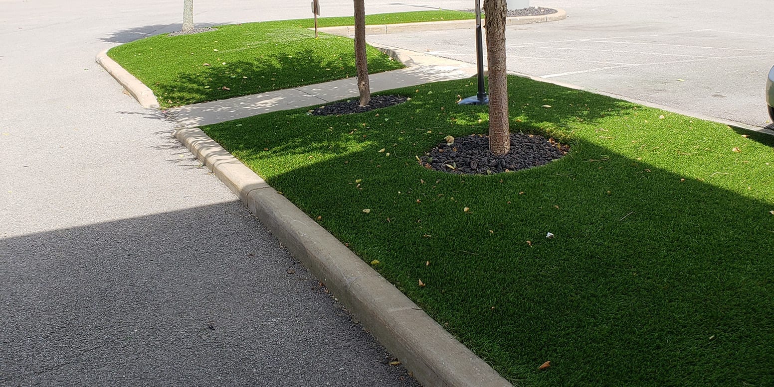 Medians covered in DuPont™ ForeverLawn® Select VR artificial grass at Hampton Inn & Suites Youngstown-Canfield