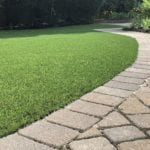 Residential backyard in Youngstown, Ohio, featuring DuPont™ ForeverLawn® Select LX