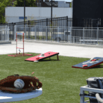 Lounge area at Segra Stadium featuring ForeverLawn Fusion Pro artificial grass.