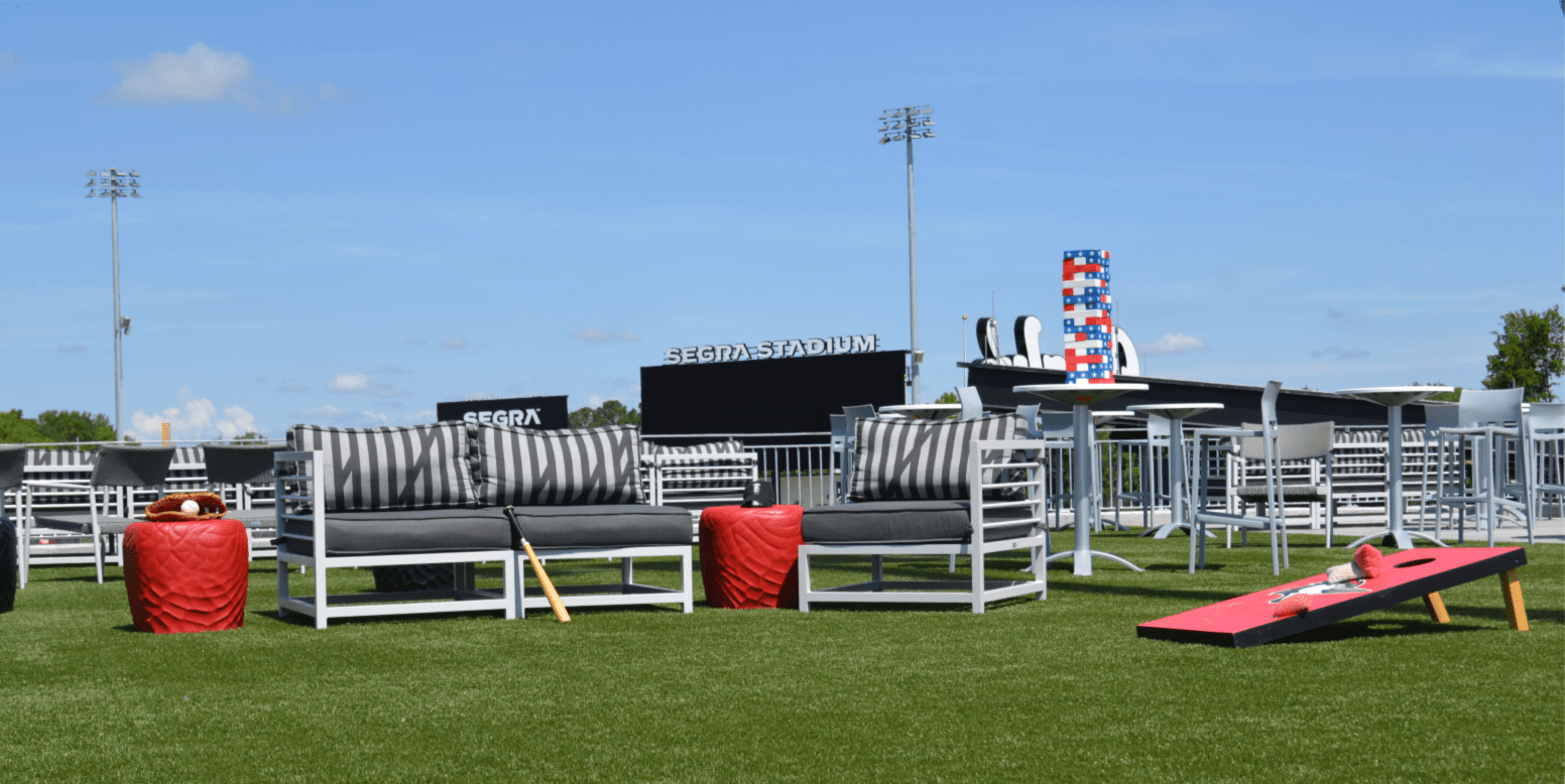 Lounge area at Segra Stadium featuring ForeverLawn Fusion Pro artificial grass.