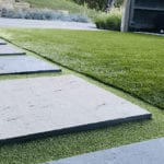 Residential outdoor entertainment space in Cranberry, PA, featuring ForeverLawn artificial grass