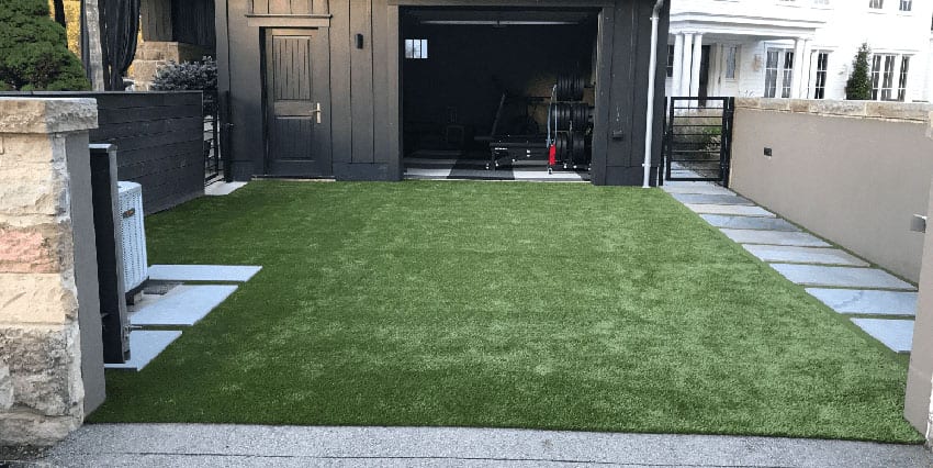 Residential outdoor entertainment space in Cranberry, PA, featuring ForeverLawn artificial grass