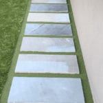 Residential outdoor entertainment space in Cranberry, PA, featuring ForeverLawn artificial grass