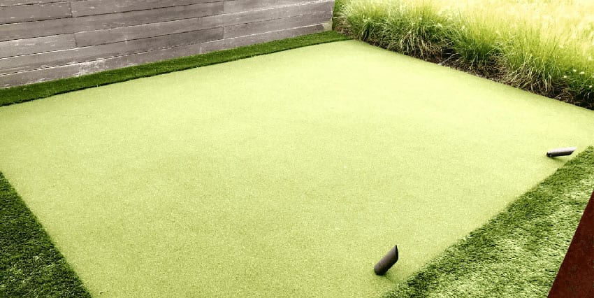 Residential outdoor entertainment space in Cranberry, PA, featuring ForeverLawn artificial grass