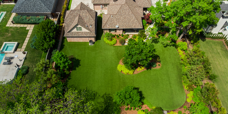 Largent residence backyard featuring ForeverLawn Landscape synthetic grass