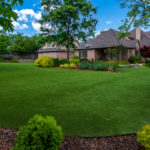 Largent residence backyard featuring ForeverLawn Landscape artificial grass warranty