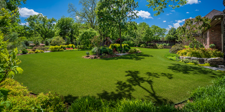 Largent residence backyard featuring ForeverLawn Landscape synthetic grass