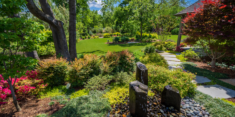 Largent residence backyard featuring ForeverLawn Landscape synthetic grass
