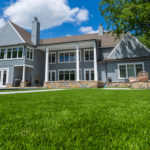 Downs residence backyard with pool featuring ForeverLawn synthetic grass installed by ForeverLawn Tulsa